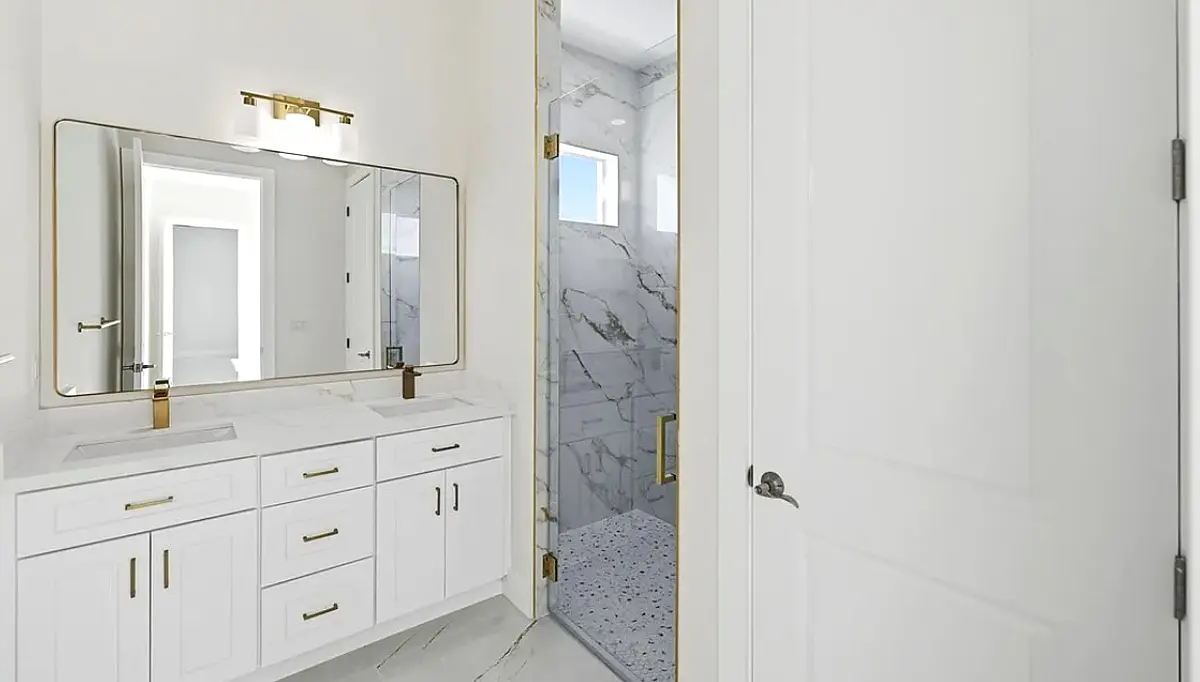 Primary bath with double vanity and glass shower